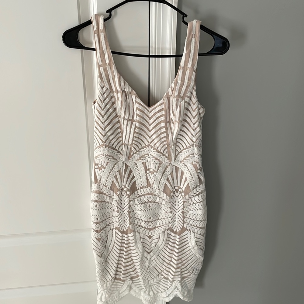 Size small white lace dress with nude underlining